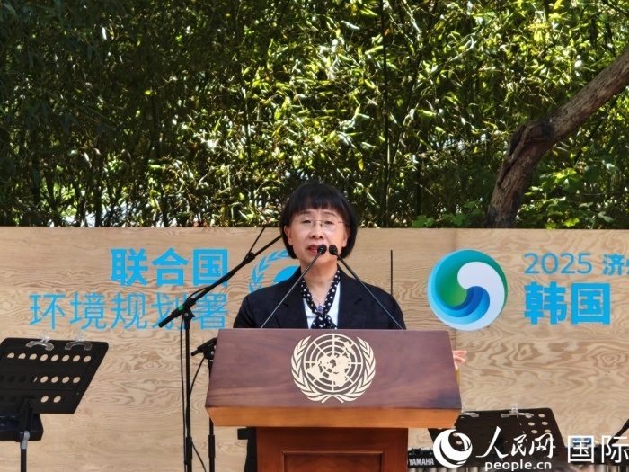 周國(guó)梅致辭。人民網(wǎng)記者 李明攝